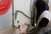 کنترل، نمونه‌برداری و کلرسنجی مستمر آب توسط کارشناسان بهداشت محیط اسلامشهر در ایام جنگ